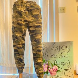 ** Billie Eilish merch** Camouflage Joggers from H&M.